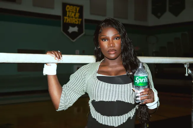 Sprite Female Rapper Sprite leans into AI remixes for music platform’s return | Marketing Dive