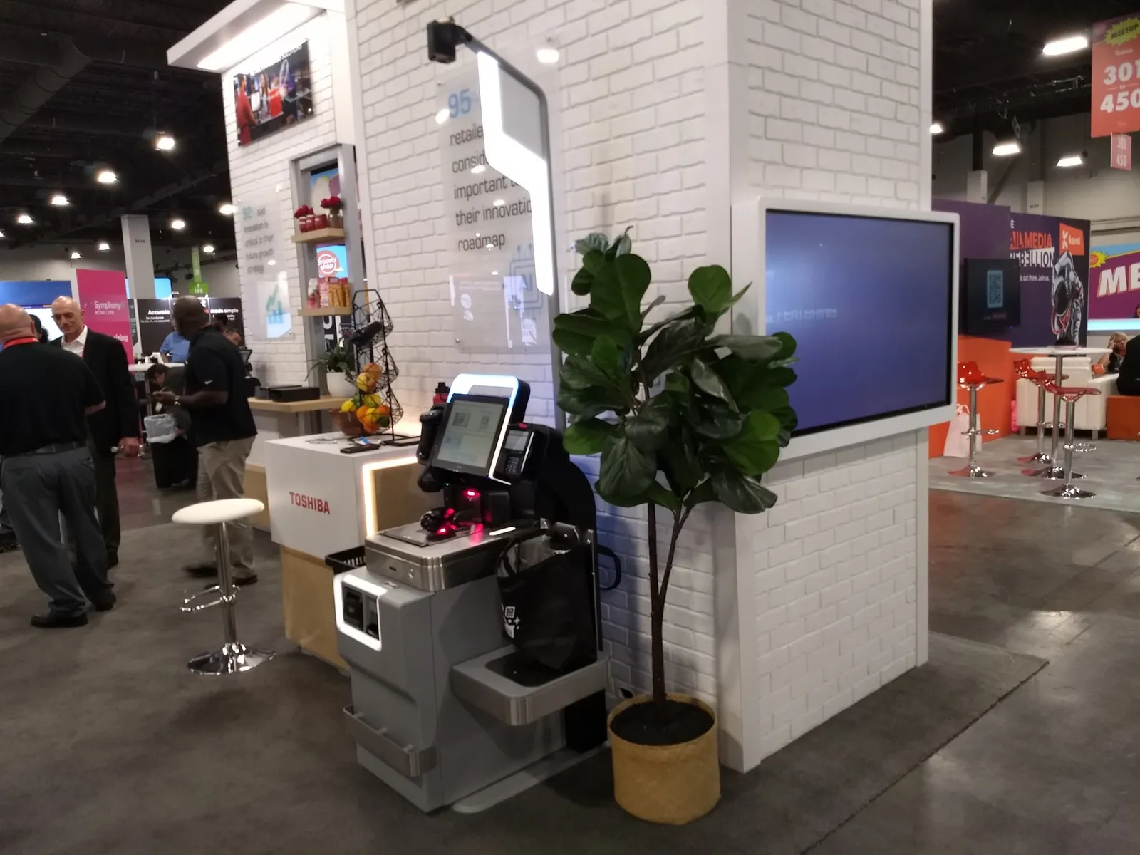 Self-checkout terminal in Grocerudhop exhibit hall