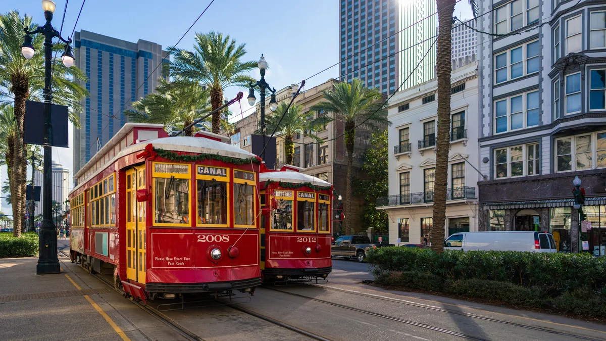 Red New Orleans Street Cars along Canal Street