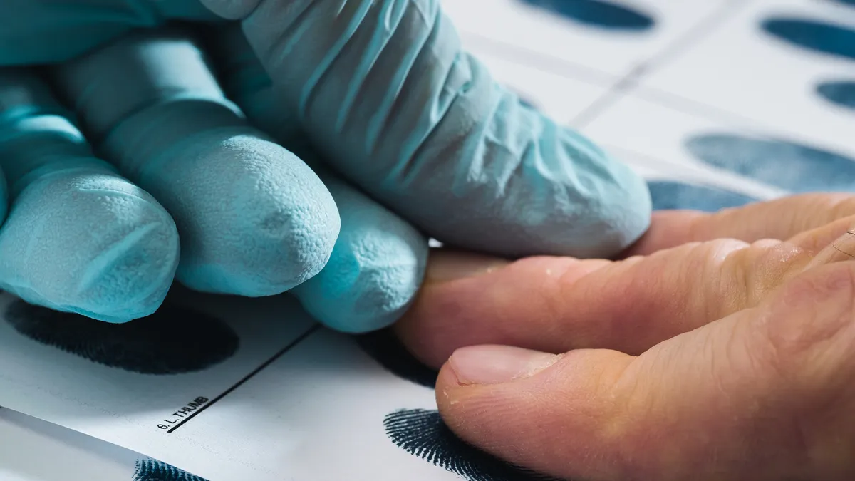 taking fingerprints of a criminal