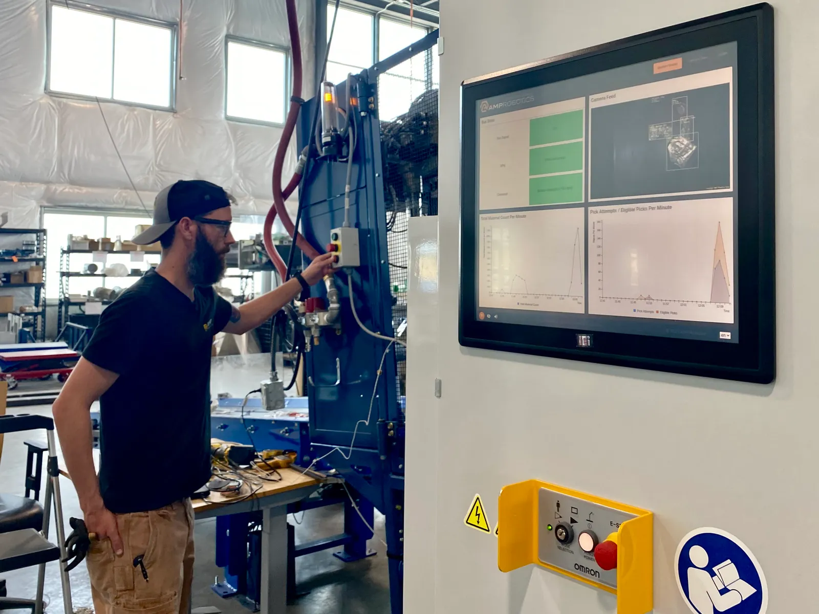 A mechanical engineer runs a robotic sorting system at AMP Robotics