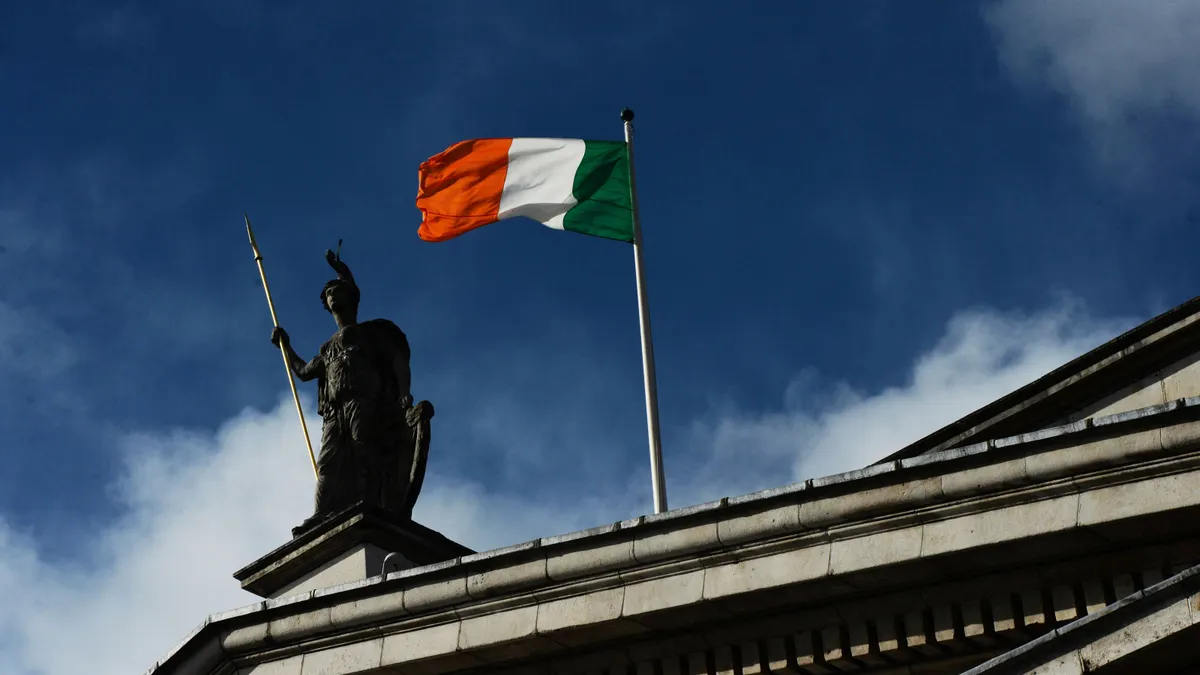 Irish flag flies above a building in Dublin in 2016.
