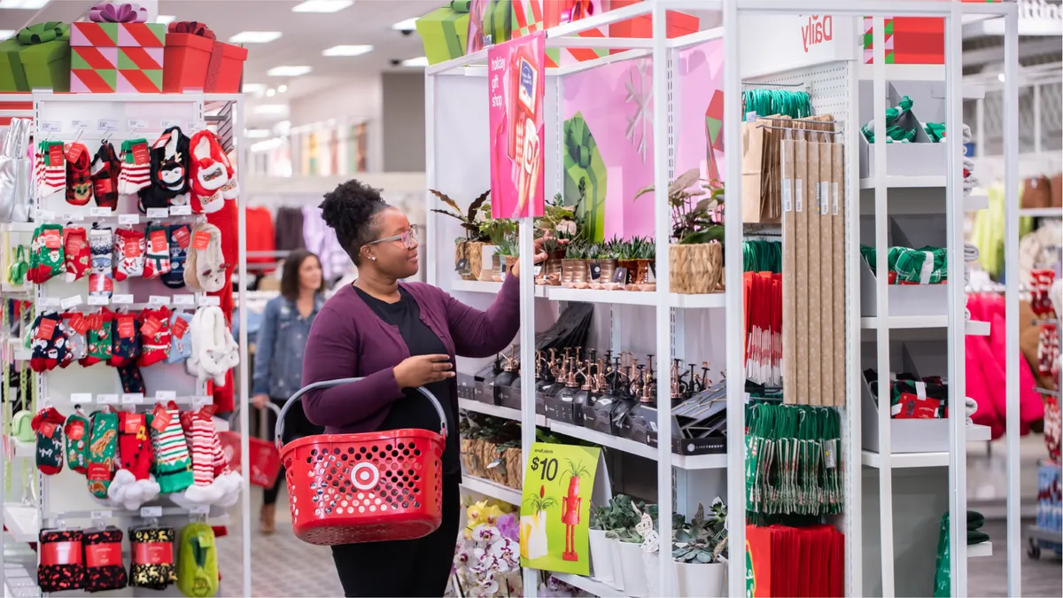 Person shops for holiday items at Target.