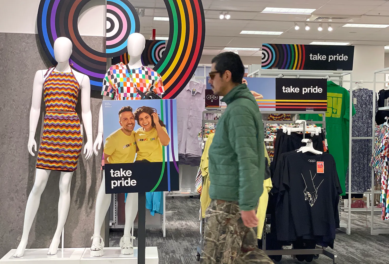 A customer walks by a Pride Month merchandise display at a Target store on May 31, 2023 in San Francisco,