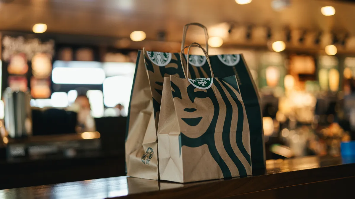 Starbucks mobile orders on a counter.