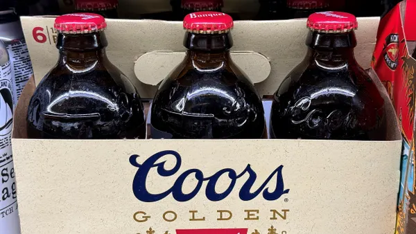 a closeup of a six-pack of Coors Banquet beer.