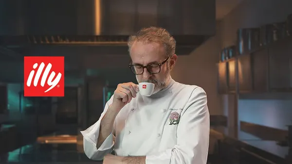 Male chef drinking espresso