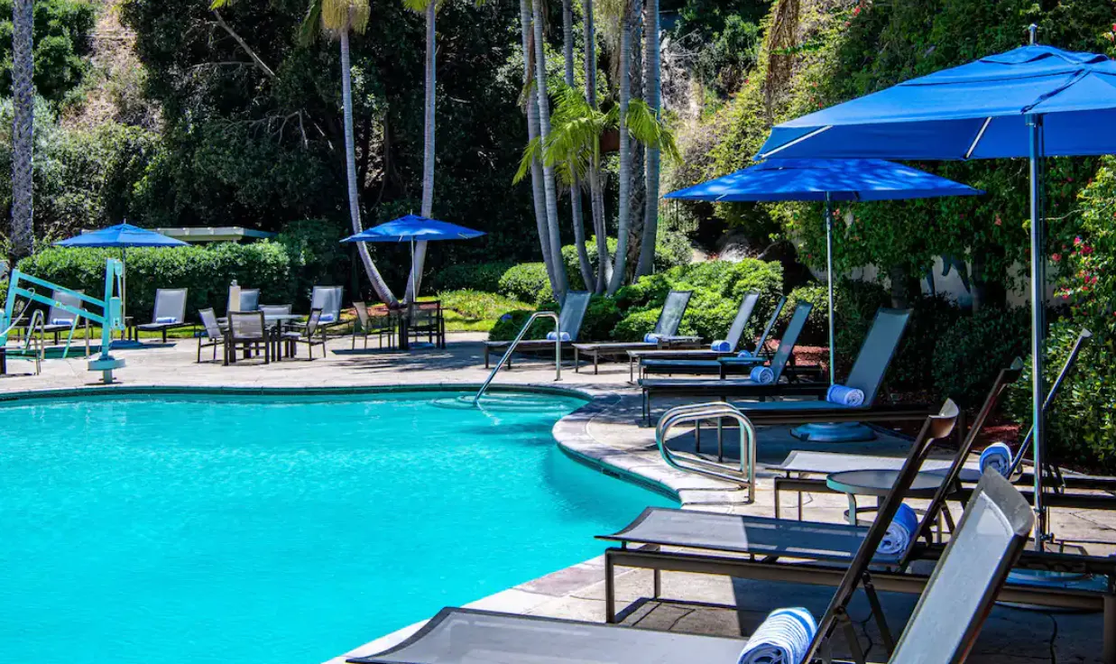 A pool area at a hotel.