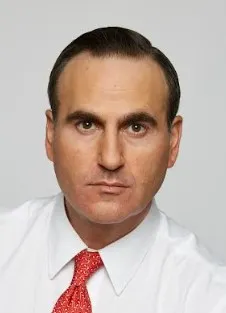 Man in white shirt and red tie