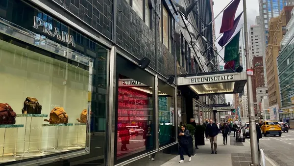 People walking by Bloomingdale's New York City store.