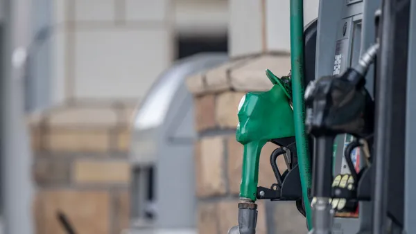 Gas pumps are seen at a gas station