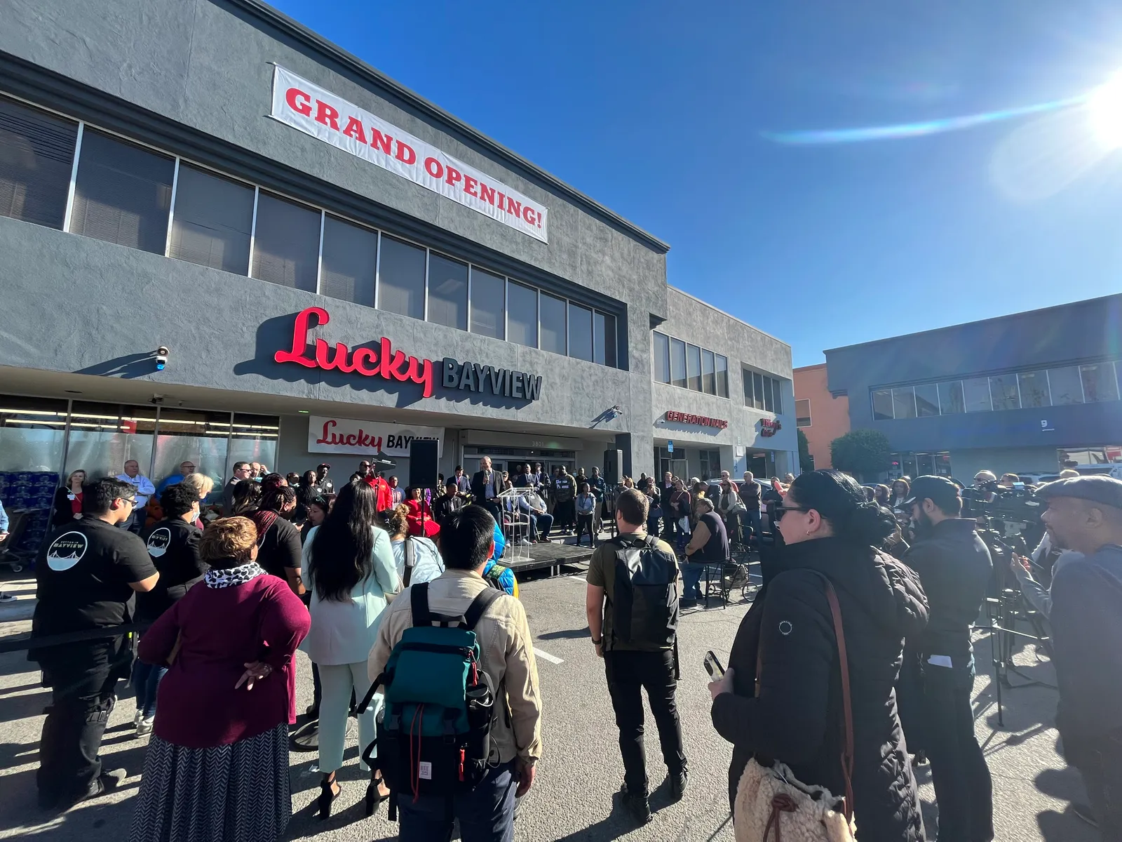 Exterior of Lucky Bayview store during grand opening celebration