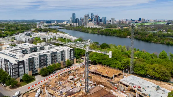 In an aerial view, the groundwork for apartments is seen undergoing construction on March 19, 2024, in Austin, Texas