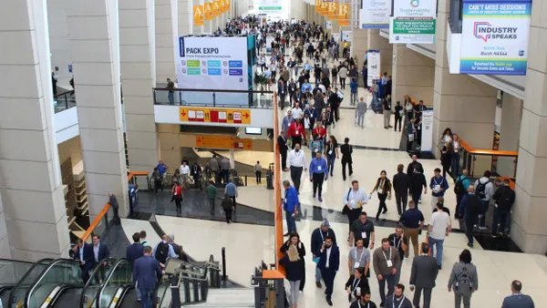 Hundreds of people in a convention center