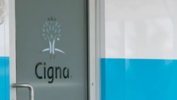 Cigna's logo is seen on a door.