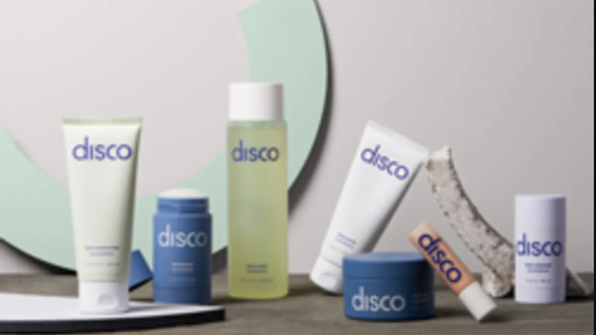 Display of various skin care bottles from Disco