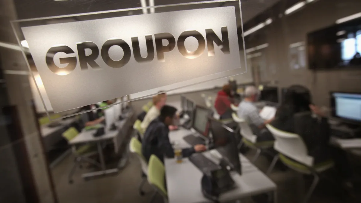 Groupon logo etched into office door