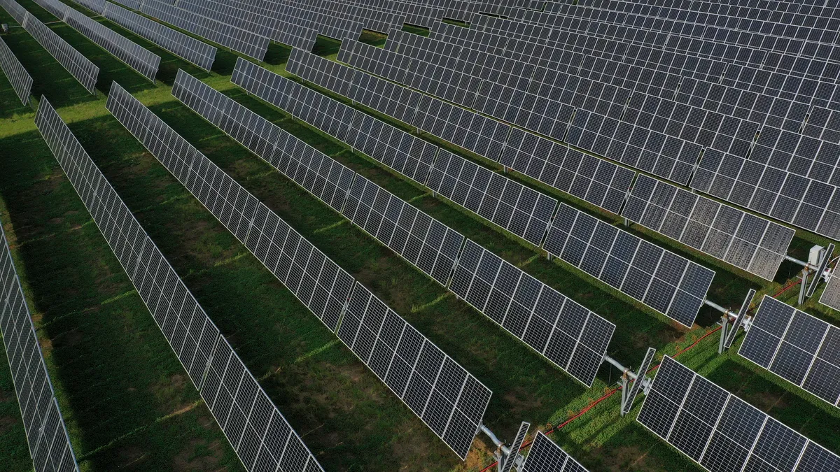 In an aerial view, the Amazon Fort Powhatan Solar Farm is seen in Disputanta, Virginia.