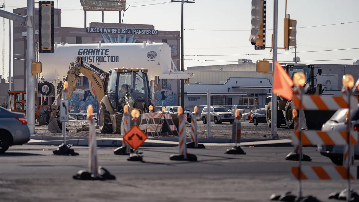 A wide angle photo shows road widening construction work underway in Tucson, Arizona.