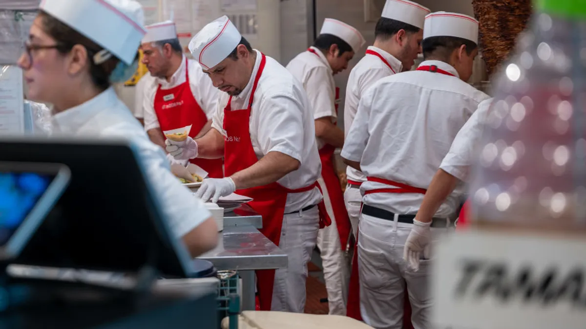 People work at a restaurant at Chelsea Market in Manhattan on February 02, 2024 in New York City.