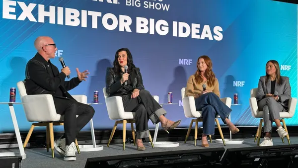 People sitting on panel discussion