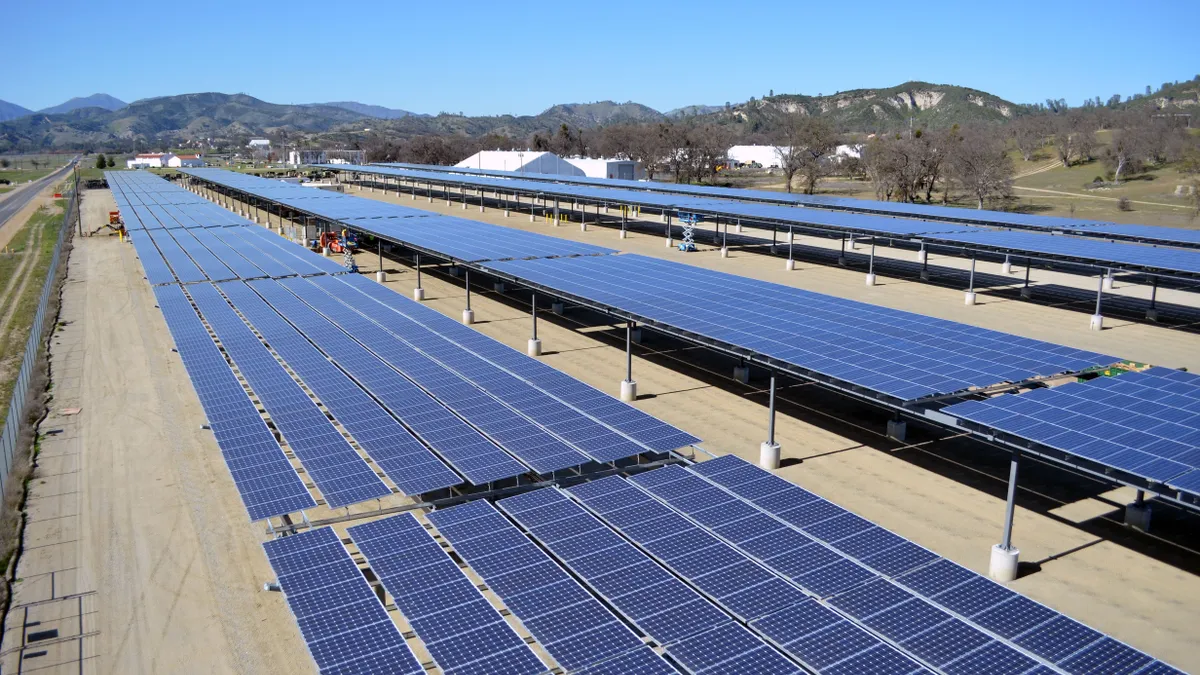 Solar panel arrays form a canopy as part of a microgrid at Fort Hunter Liggett, Calif., March 12, 2013.