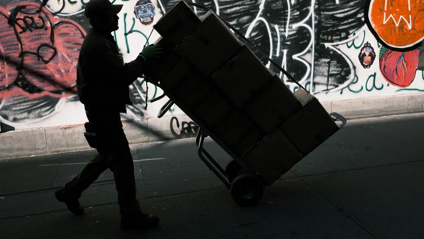 A man moves a box on November 21, 2019 in New York City.