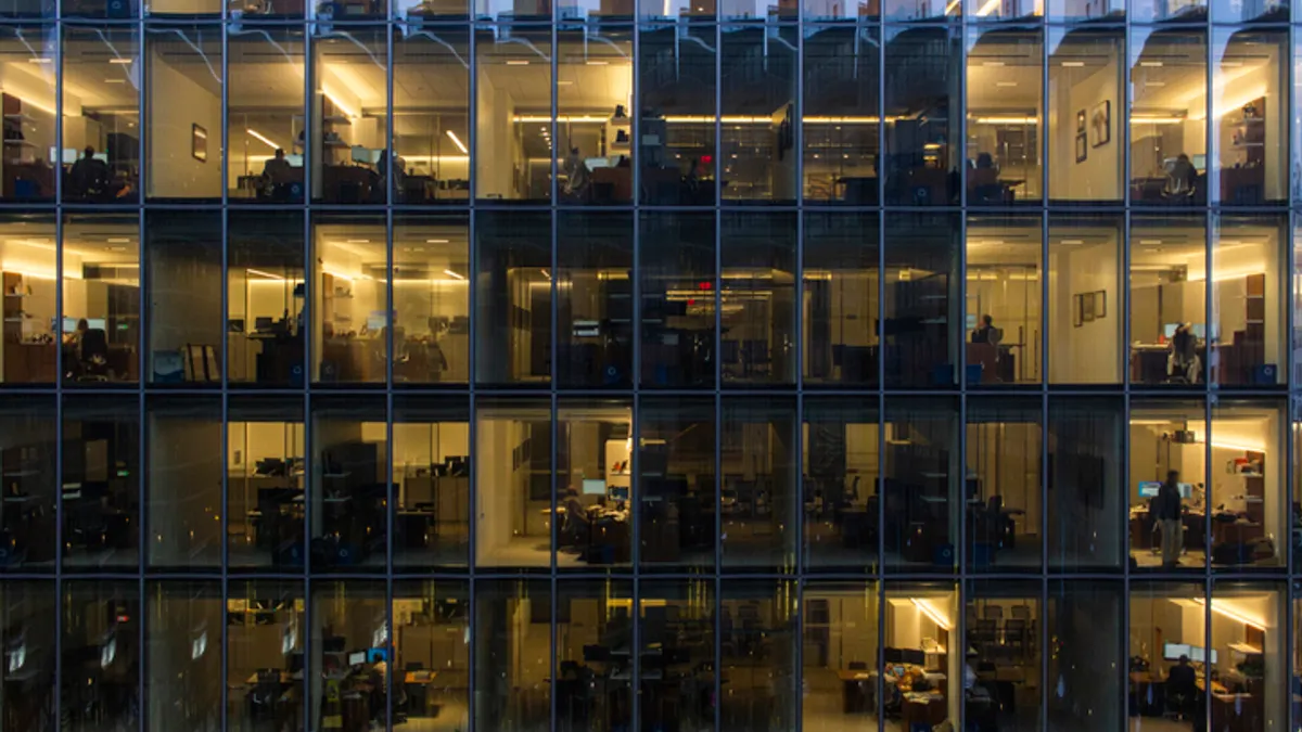 Office space behind glass curtain wall