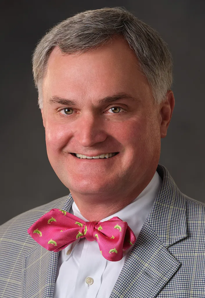 A headshot of attorney Cameron Hill.