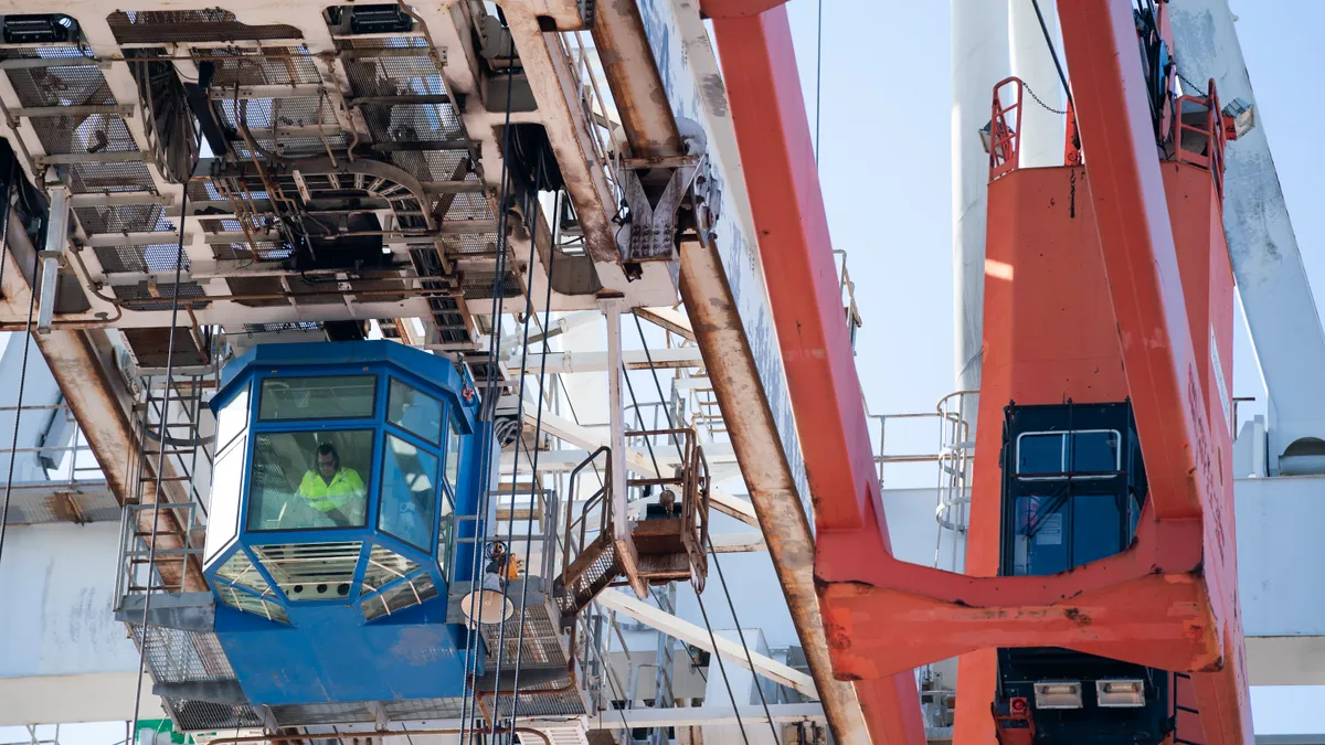 A crane operator works at the Garden City Port Terminal on November 12, 2021 in Garden City, Georgia.