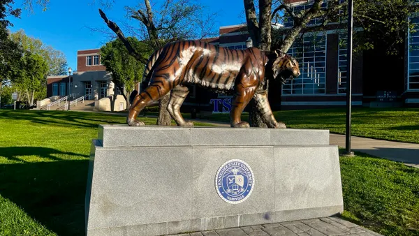 A 500-pound bronze statue of a tiger stamped with the Tennessee State University seal.