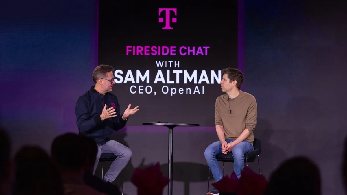 OpenAI CEO Sam Altman on stage at a T-Mobile event.