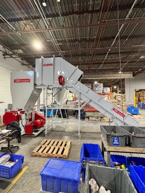 A granulator inside a warehouse