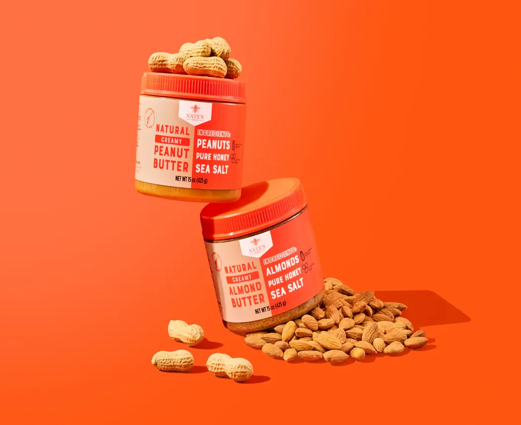 Containers of Nate's peanut butter with honey.