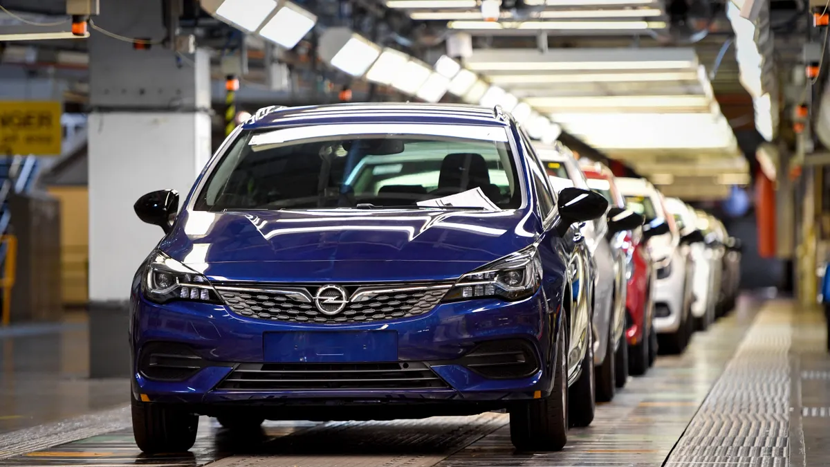 Vehicles on the production line at the Vauxhall Ellesmere Port plant in England