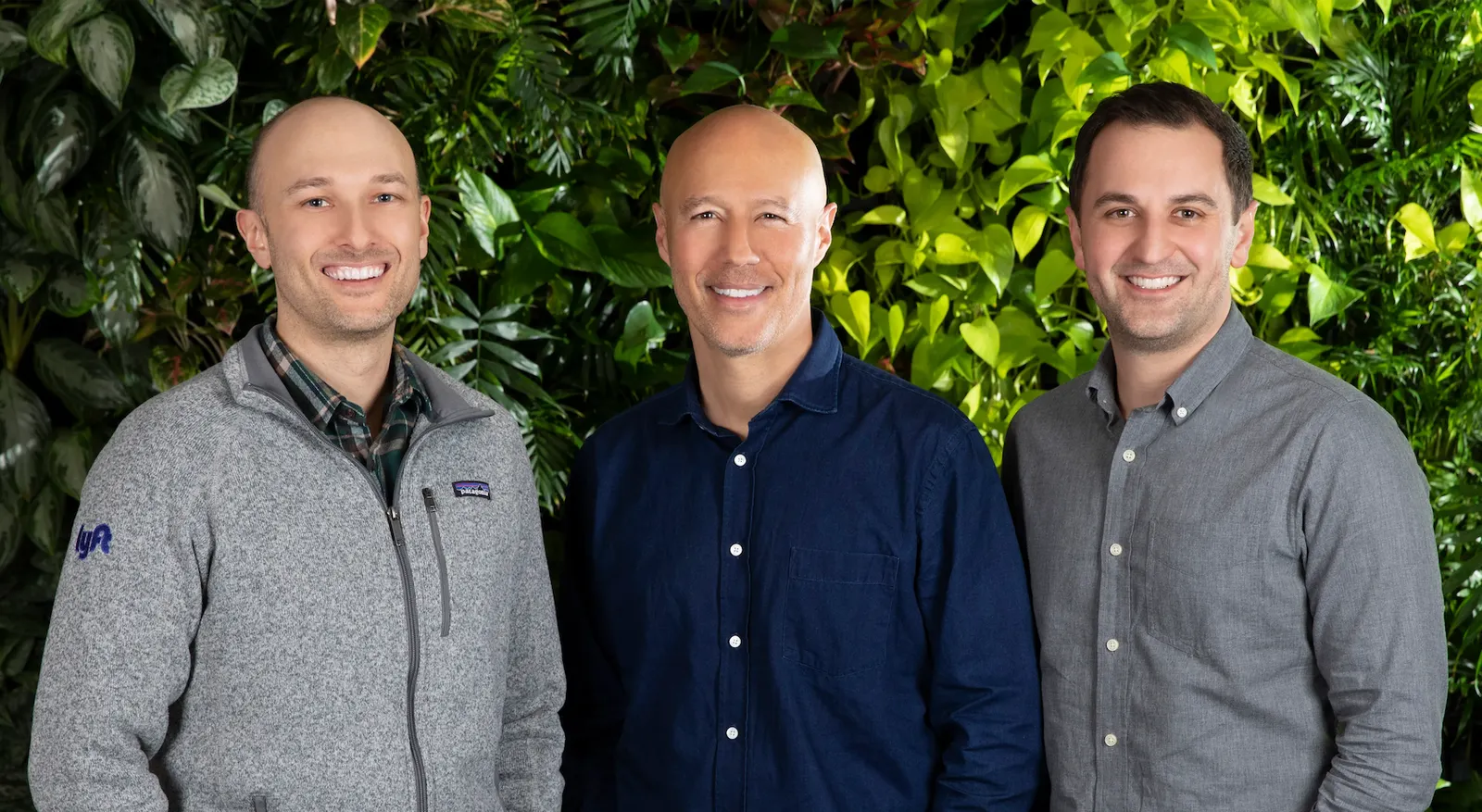 A corporate photo of Lyft CEO David Risher, center, co-founder Logan Green, left and co-founder John Zimmer, right.