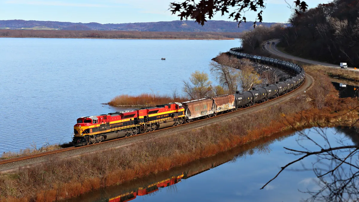 Kansas City Southern SD70ACes 4183 and 4045 lead westbound CP train 575 along the upper Mississippi at Maple Springs, Minn. KCS power is becoming common on trains coming up from Kansas City.