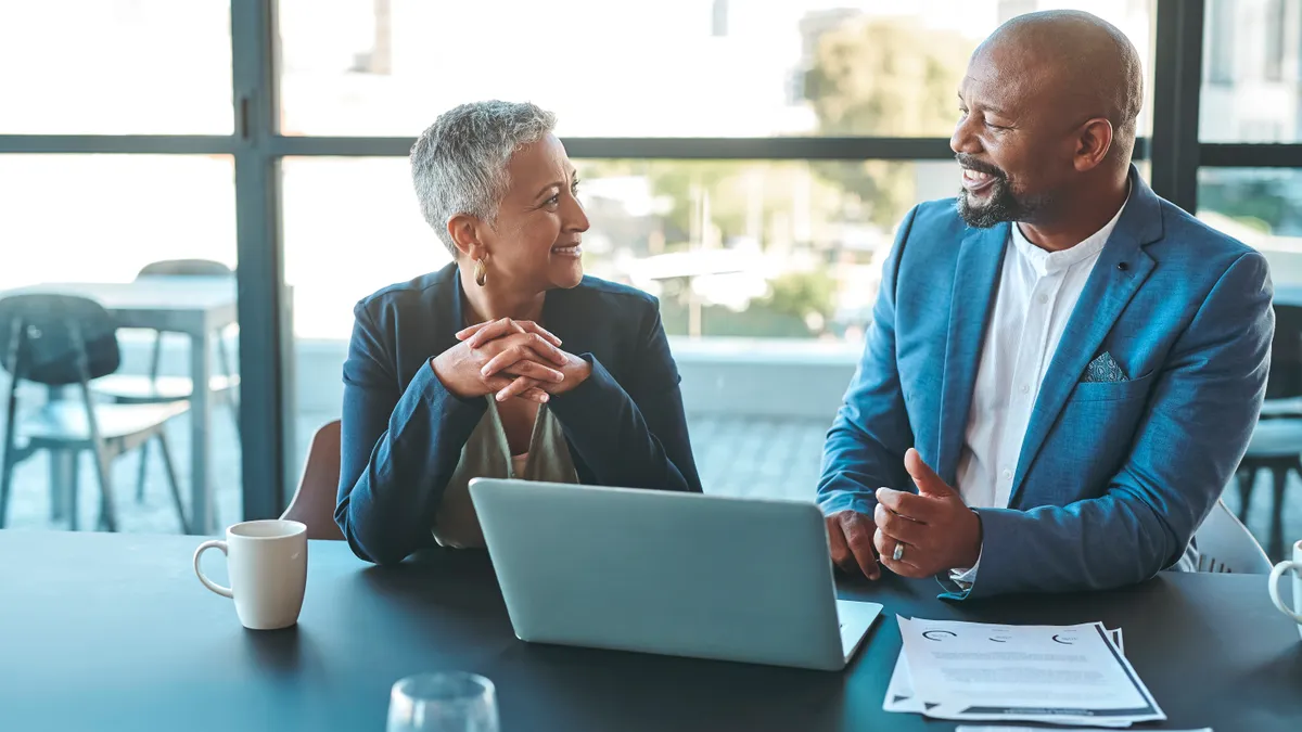 A lawyer and their client have a discussion