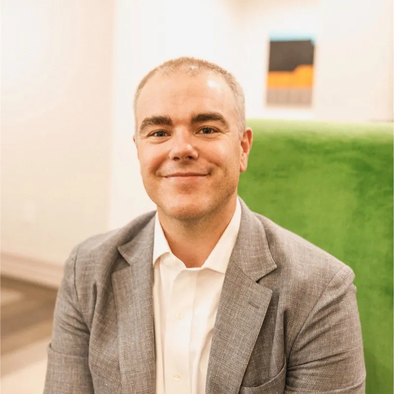 Headshot of Adam Logan.