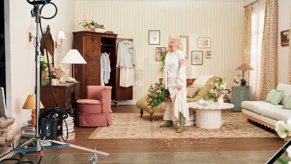 Pamela Anderson poses on set for Aerie's "100% Aerie Real" campaign.