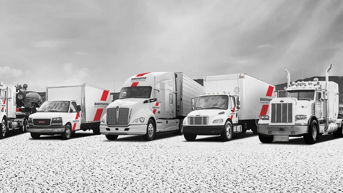 Trucks are parked in a Siemens Transportation Group promotional illustration.