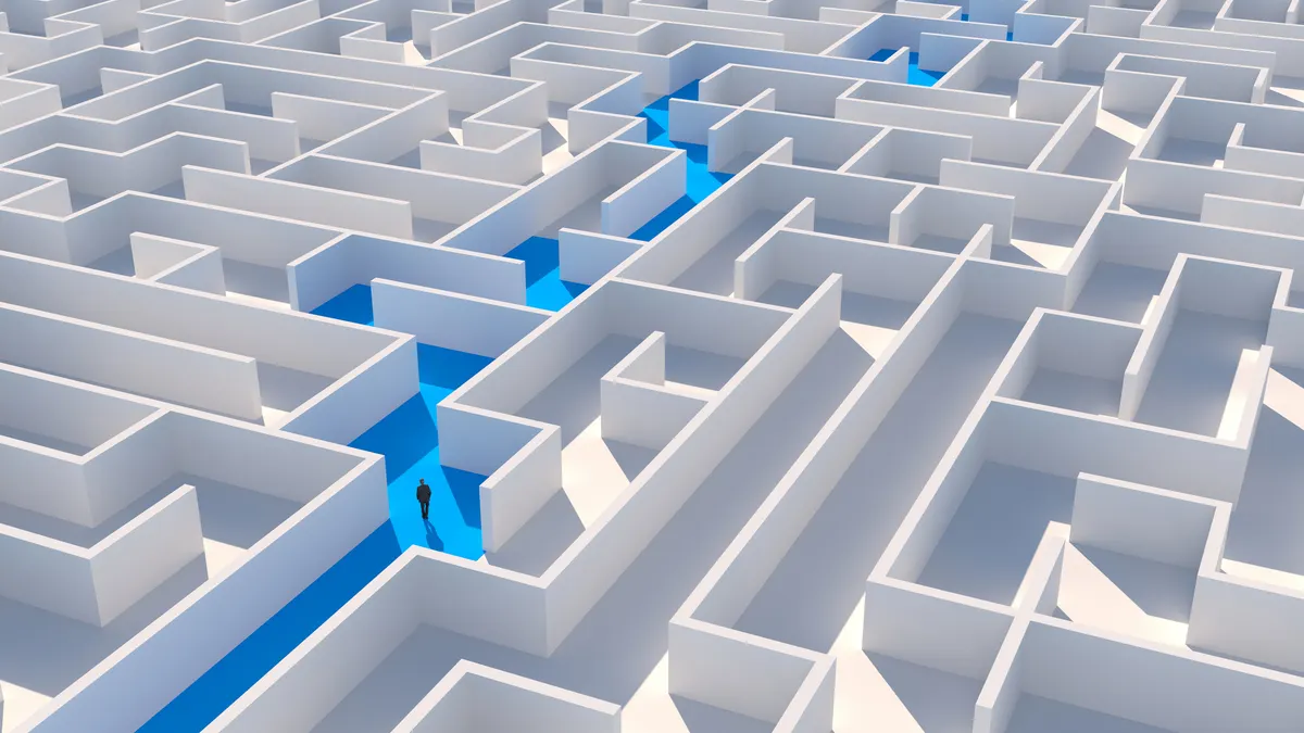 Business person inside a maze