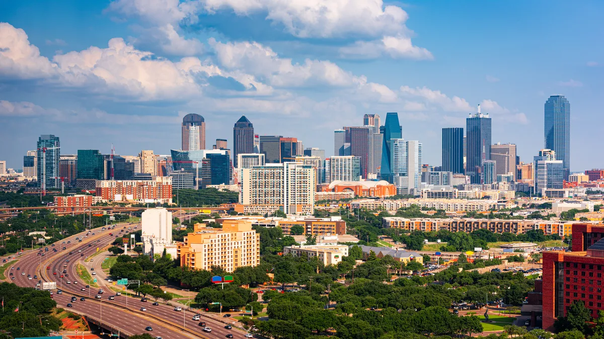 City skyline from above over highways.