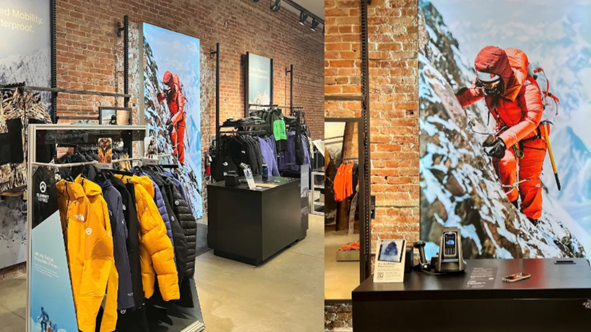 Outdoor clothing on display racks inside a store