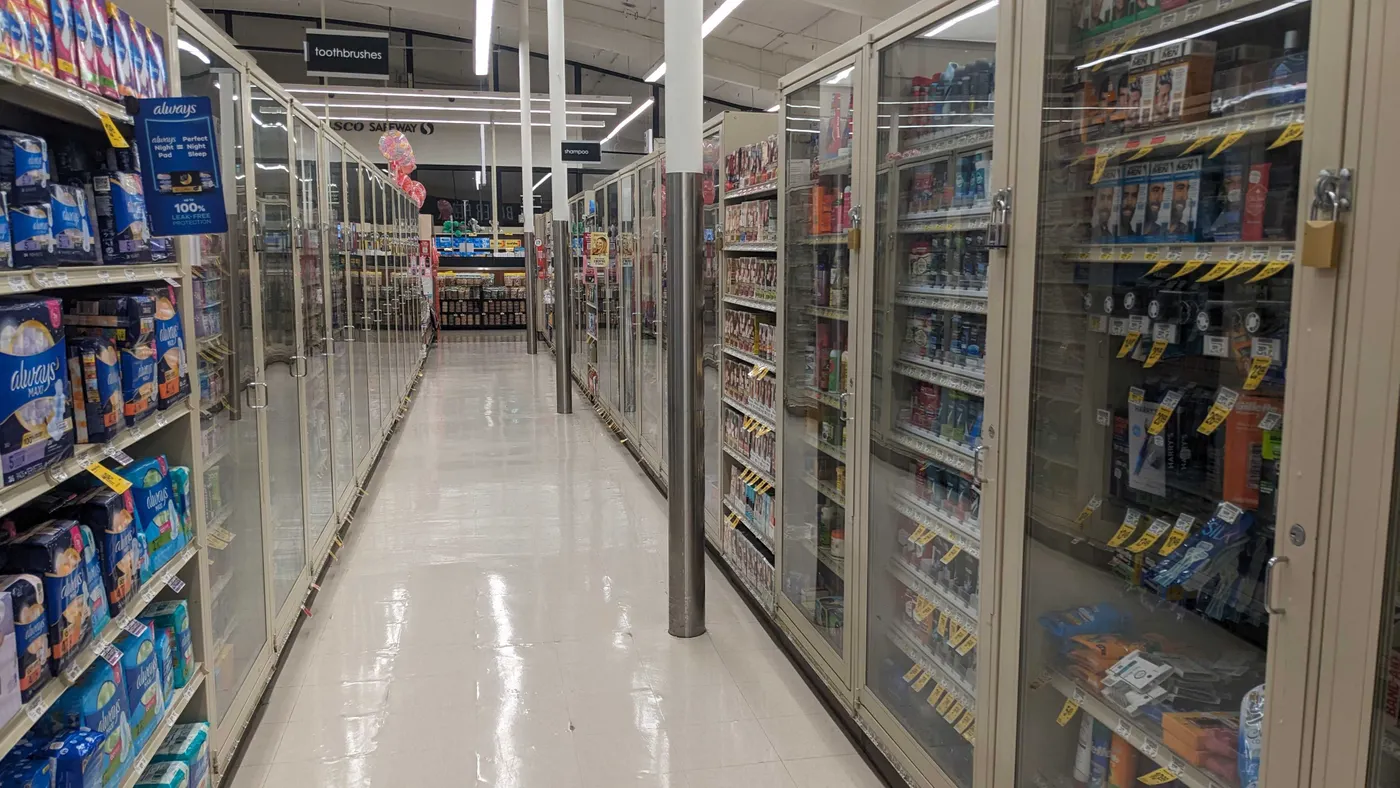 Locked up merchandise at a grocery store.