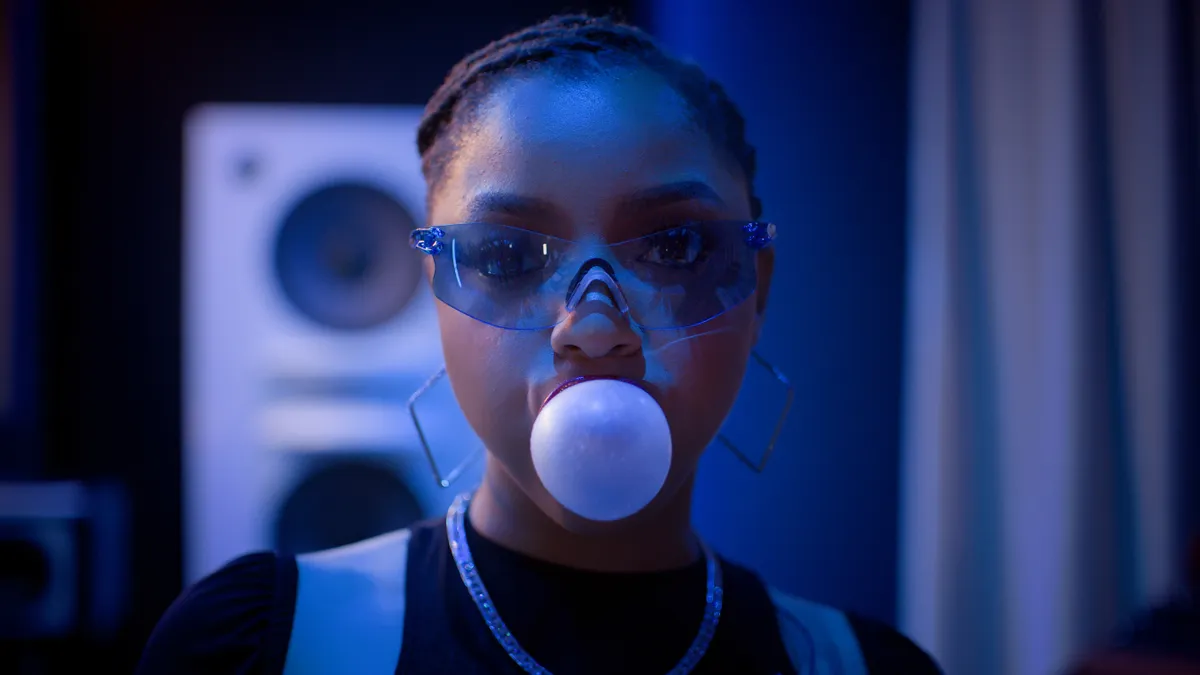 Singer Chloë Bailey blows a gum bubble as part of a Trident campaign