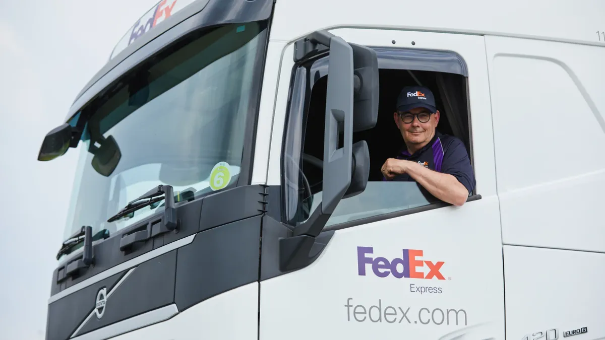 A FedEx Express driver in a truck. The company this month debuted the use of renewable diesel fuel in its Netherlands linehaul operation to lower emissions.