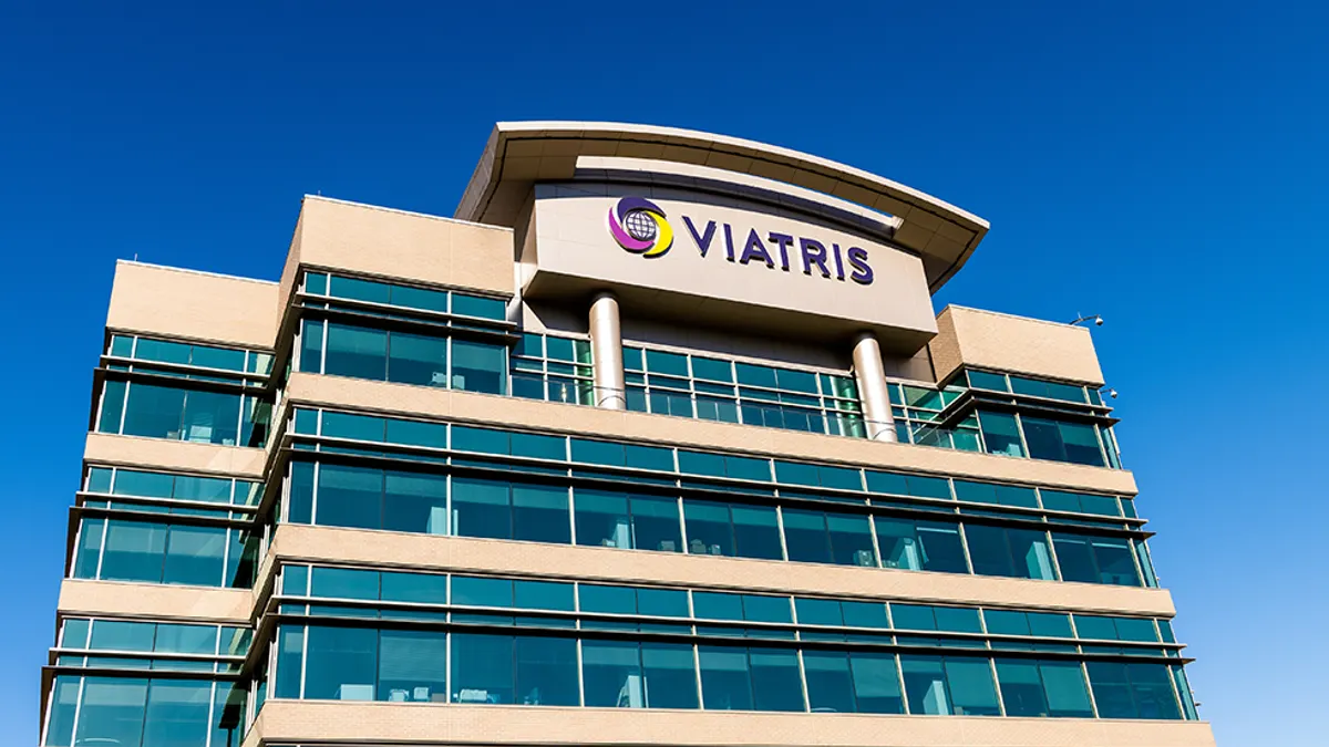 A corporate building is seen with a sign for the company Viatris