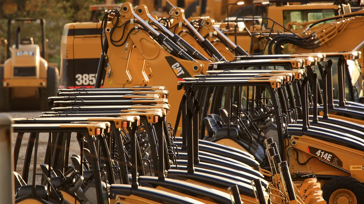 Heavy caterpillar machinery stands at dealership Quinn Co. in City of Industry, California.