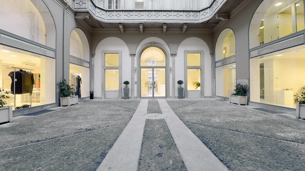 Large, empty open space outdoor atrium in Milan.